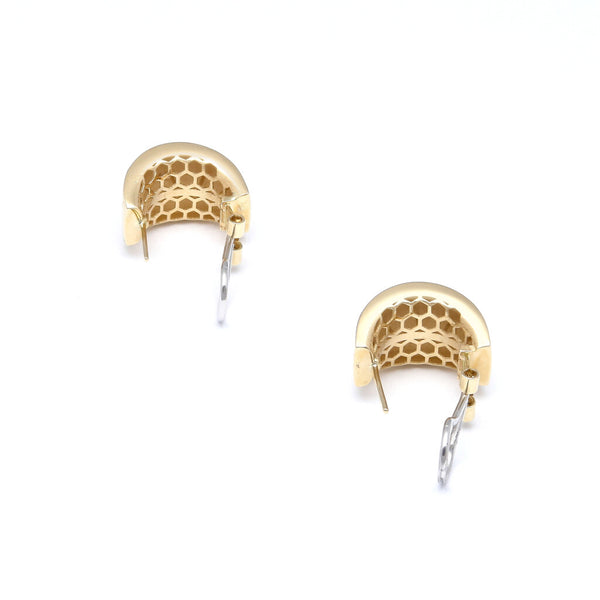 Aretes lisos en oro amarillo 14 kilates.