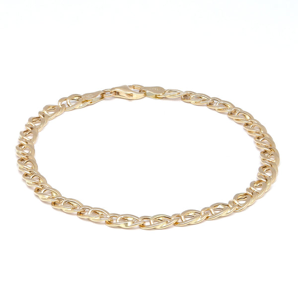 Pulsera eslabón nudo egipcio en oro amarillo 14 kilates.