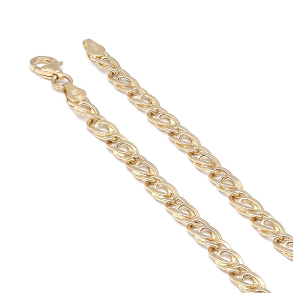 Pulsera eslabón nudo egipcio en oro amarillo 14 kilates.