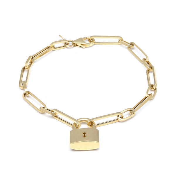 Pulsera eslabón cruzado combinado con colgante motivo candado en oro amarillo 14 kilates.