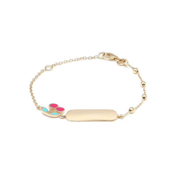 Pulsera infantil eslabón cruzado con esferas, placa y dije motivo cerezas con esmalte en oro amarillo 14 kilates.