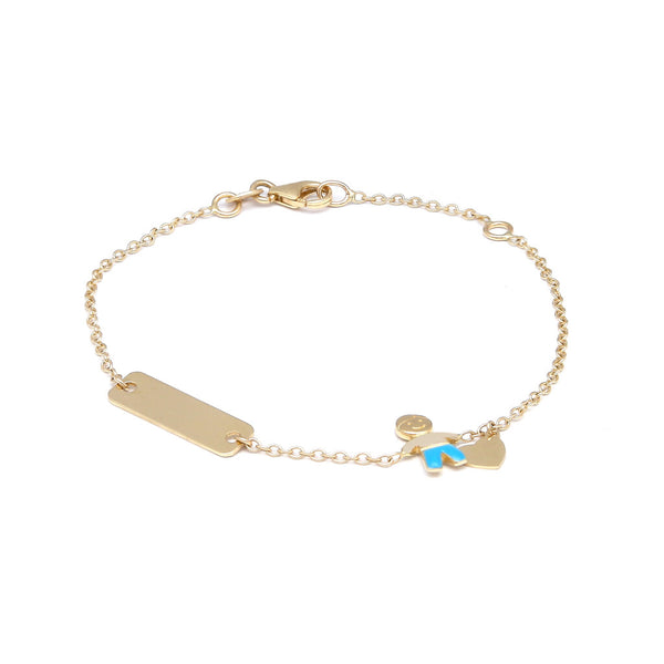 Pulsera infantil eslabón cruzado con placa y dije motivo niño y corazón con esmalte en oro amarillo 14 kilates.