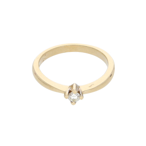 Anillo solitario con diamante en oro amarillo 14 kilates.