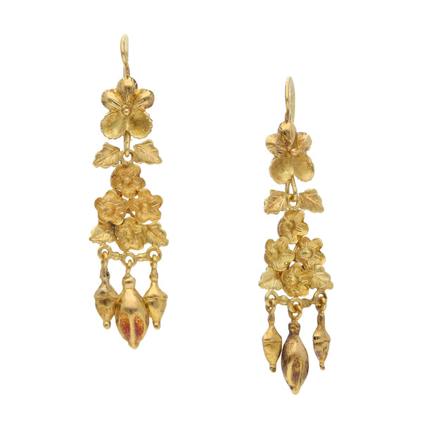 Aretes articulados con colgantes en oro amarillo 18 kilates.