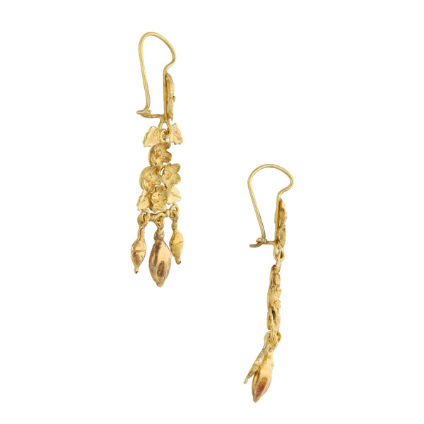 Aretes articulados con colgantes en oro amarillo 18 kilates.