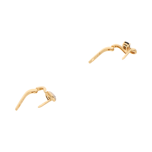 Aretes articulados con diamantes y zafiros en oro amarillo 14 kilates.