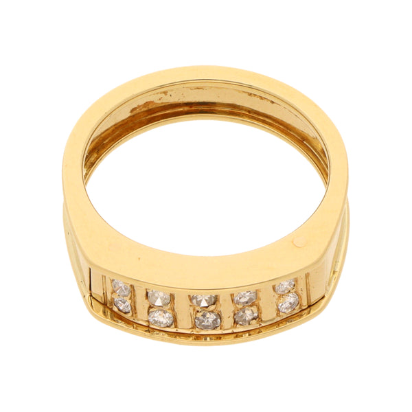 Anillo estilizado con diamantes en oro amarillo 18 kilates.