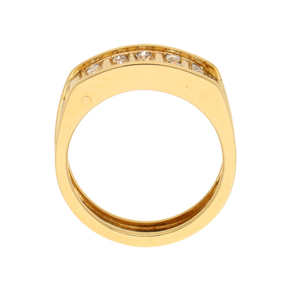 Anillo estilizado con diamantes en oro amarillo 18 kilates.