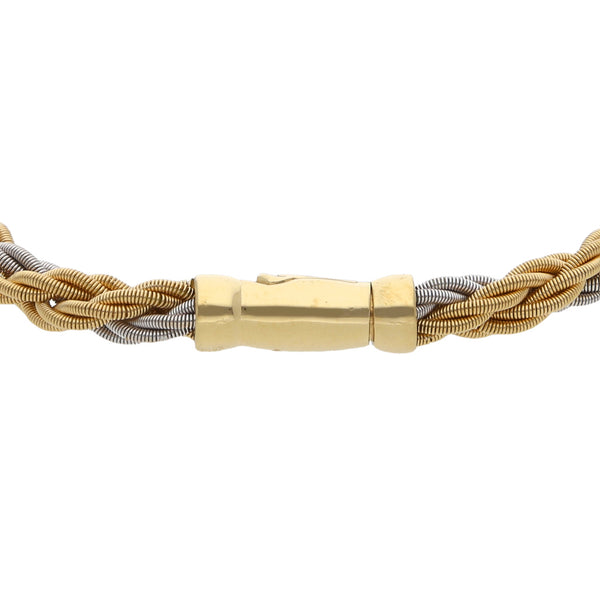 Pulsera eslabón trenzado en oro dos tonos 18 kilates.