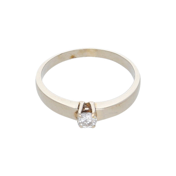 Anillo solitario con diamante en oro blanco 14 kilates.