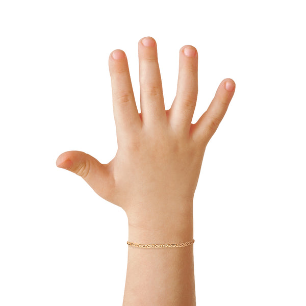 Pulsera para niño eslabón nudo egipcio en oro amarillo 14 kilates.