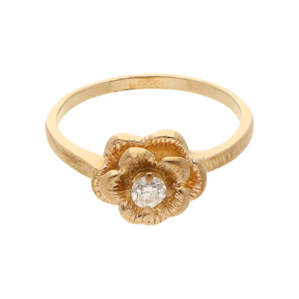 Anillo diseño especial motivo flor con diamante en oro amarillo 14 kilates.