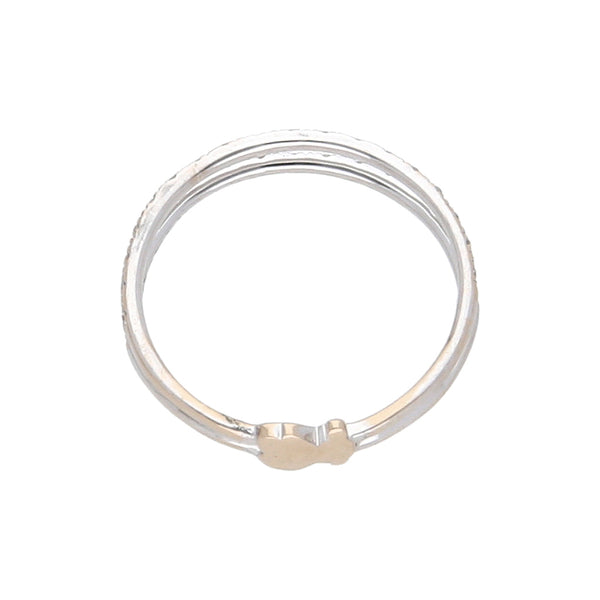 Anillo calado firma Tous con diamantes en oro blanco 18 kilates.