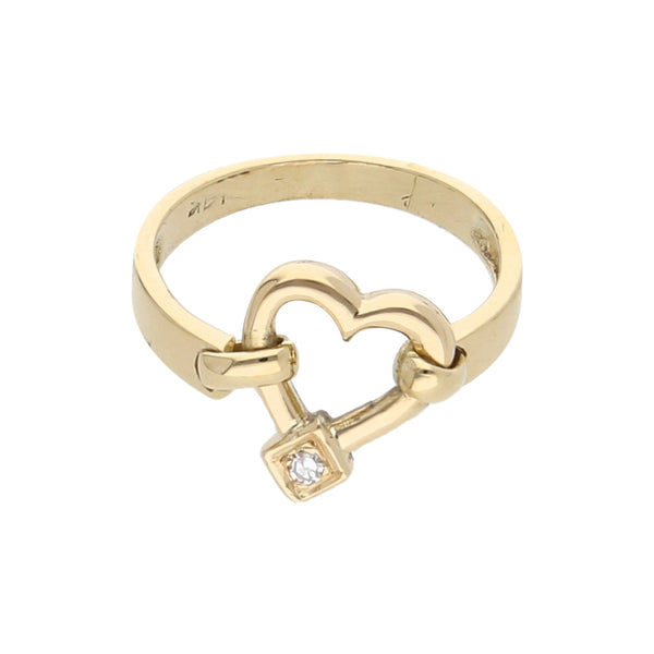 Anillo calado motivo corazón con diamante en oro amarillo 14 kilates.