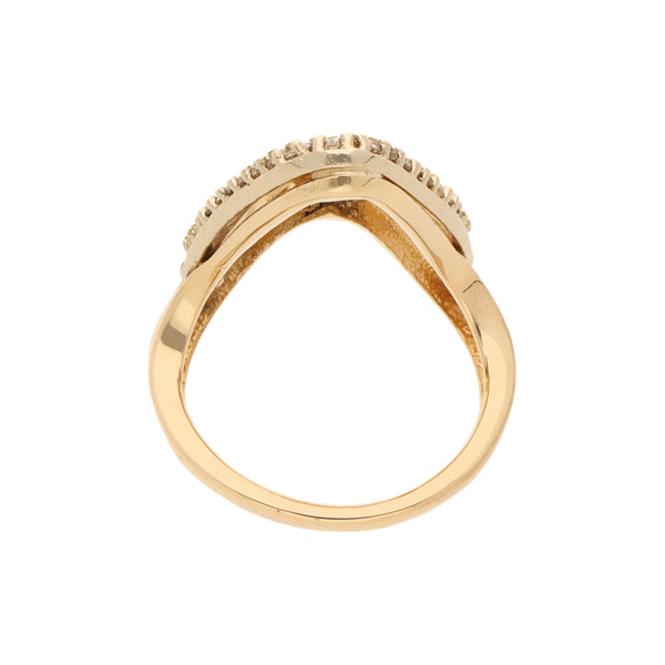 Anillo ondulado con diamantes en oro amarillo 14 kilates.