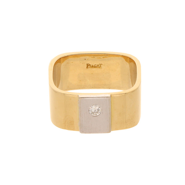 Anillo cuadrado con diamante firma Piaget en oro dos tonos 18 kilates.