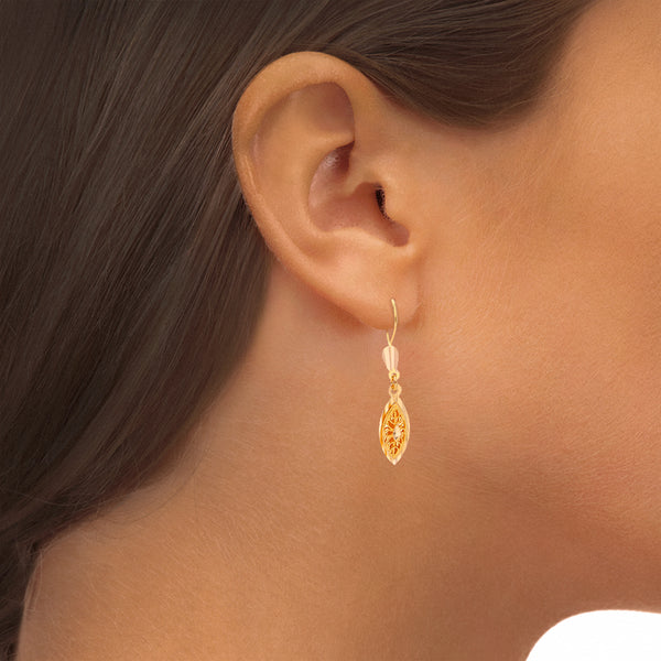 Aretes articulados con colgantes en oro amarillo 22 kilates.