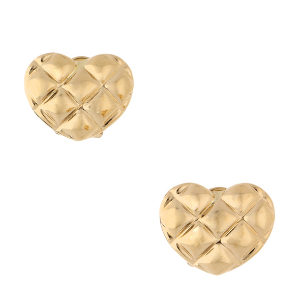 Aretes huecos motivo corazón en oro amarillo 14 kilates.