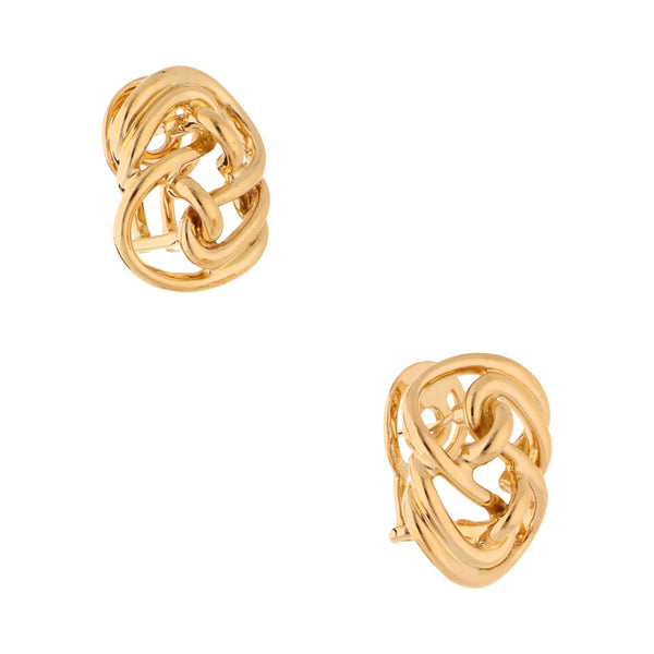 Aretes tubulares firma Tane en oro amarillo 18 kilates.