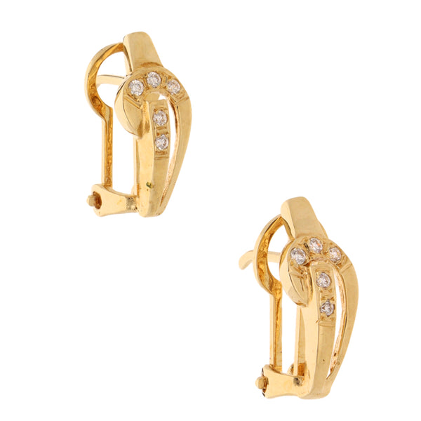 Aretes calados con circonias en oro amarillo 14 kilates.