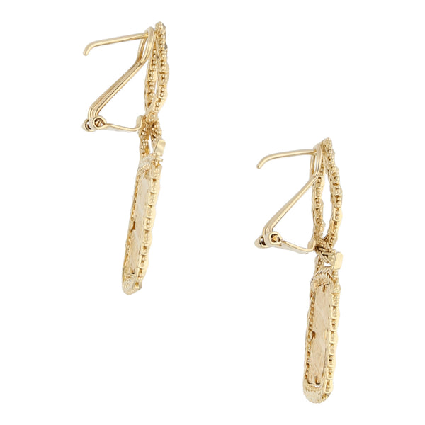 Aretes boleados calados en oro amarillo 14 kilates.