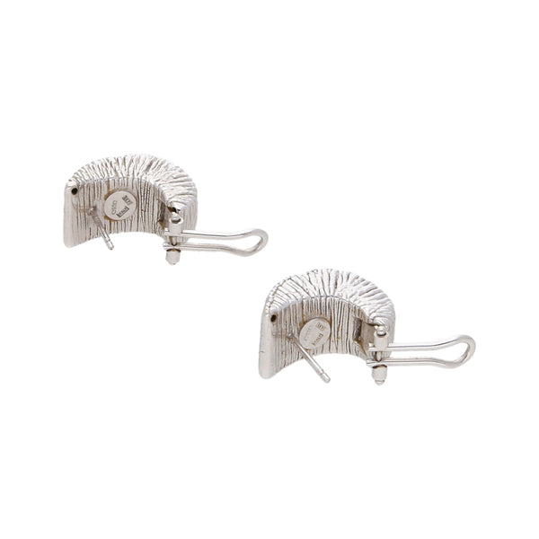 Aretes huecos estriados en oro blanco 14 kilates.