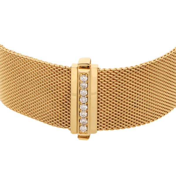 Pulsera eslabón tejido firma Tiffany & Co. con diamantes en oro amarillo 18 kilates.