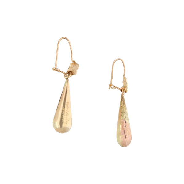 Aretes con colgantes huecos en oro tres tonos 14 kilates.