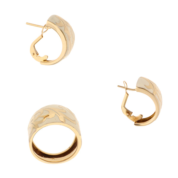 Juego de anillo y aretes estilizados con esmalte en oro amarillo 14 kilates.