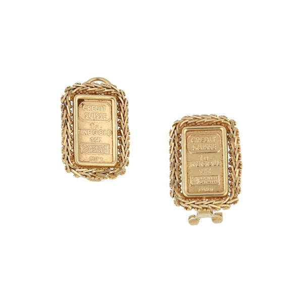 Aretes boleados en oro amarillo 14 kilates.