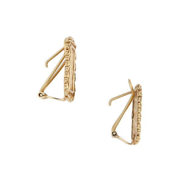 Aretes boleados en oro amarillo 14 kilates.