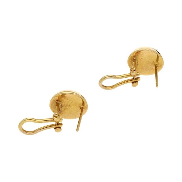 Aretes huecos en oro amarillo 14 kilates.