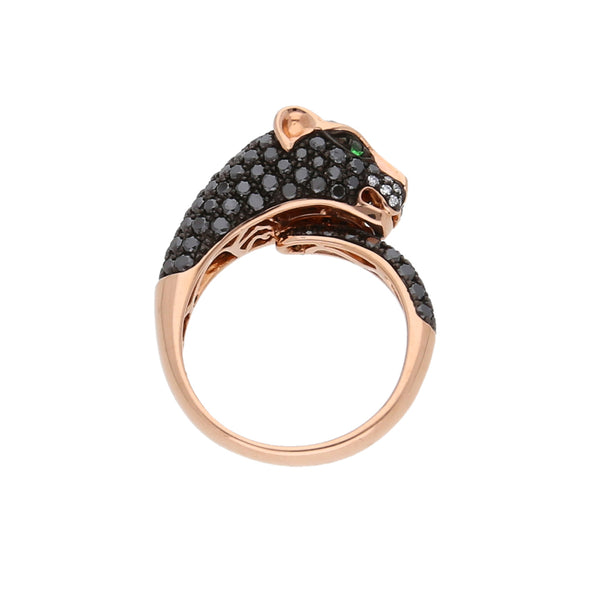 Anillo estilizado con diamantes y sintéticos motivo felino en oro rosa 14 kilates.