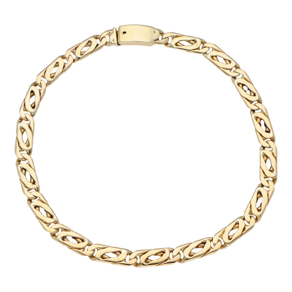 Pulsera eslabón nudo egipcio en oro amarillo 14 kilates.