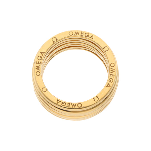 Argolla calada firma Omega con diamantes en oro amarillo 18 kilates.