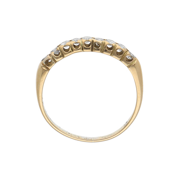 Anillo calado con diamantes en oro amarillo 14 kilates.