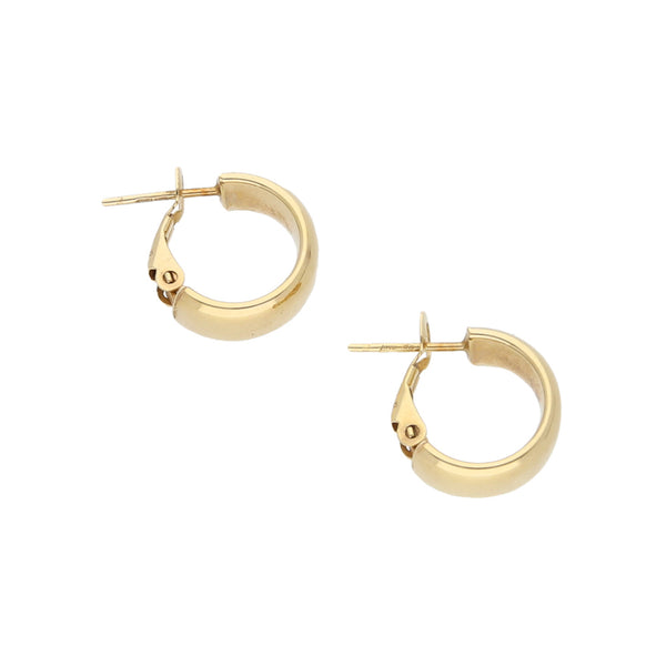 Aretes lisos en oro amarillo 14 kilates.