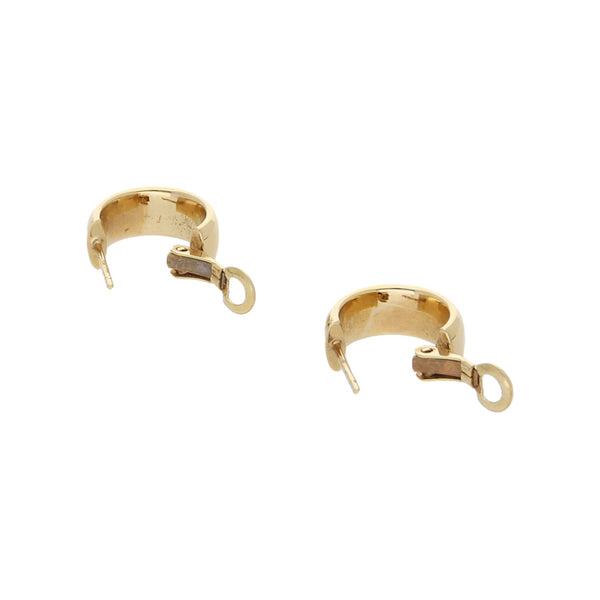 Aretes lisos en oro amarillo 14 kilates.