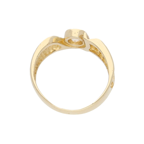 Anillo calado con circonia en oro amarillo 14 kilates.