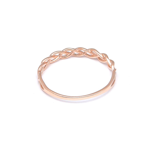 Anillo calado en oro rosa 14 kilates.