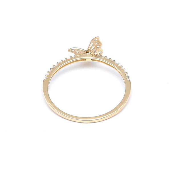 Anillo calado motivo mariposa con circonias en oro amarillo 14 kilates.