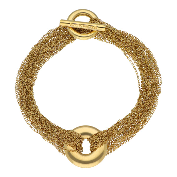 Pulsera de doce hilos eslabón cruzado firma Tiffany & Co en oro amarillo 18 kilates.