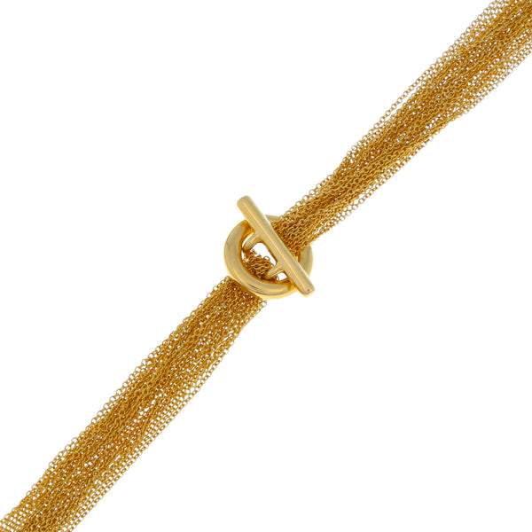 Gargantilla doce hilos eslabón cruzado con colgante firma Tiffany & Co en oro amarillo 18 kilates.