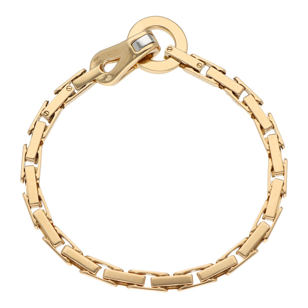 Pulsera eslabón articulado firma Cartier en oro amarillo 18 kilates.