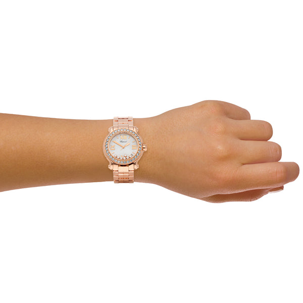 Reloj Chopard para dama modelo Happy Sport en oro rosa 18 kilates.