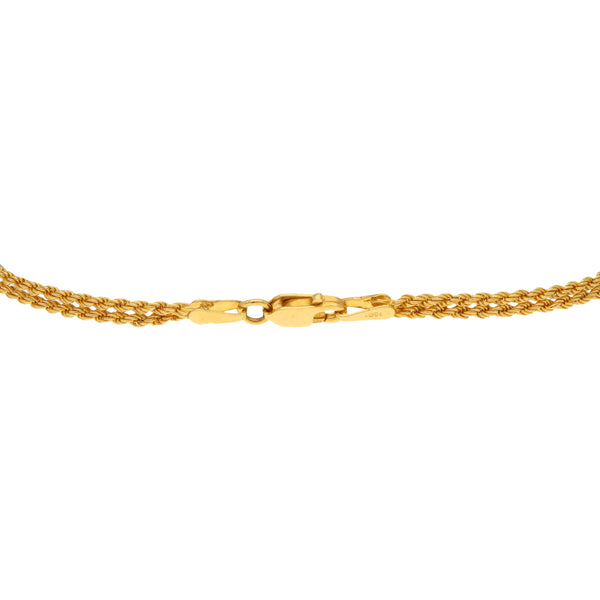 Pulsera eslabón torzal con aplicaciones en oro amarillo 18 kilates.