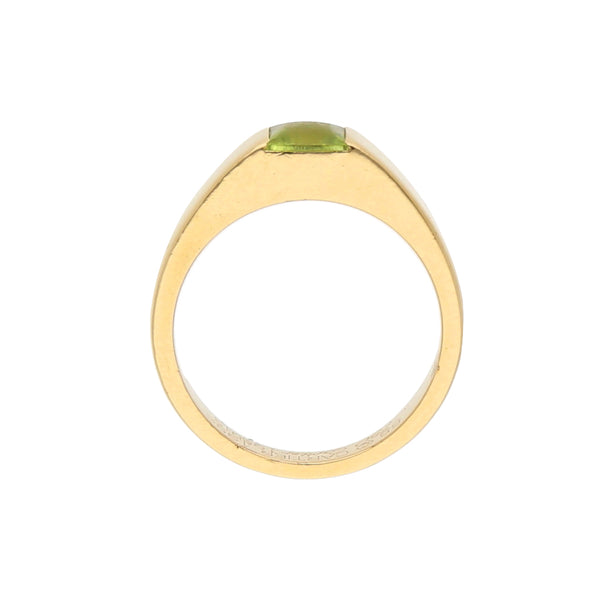 Anillo diseño especial firma Cartier con sintético en oro amarillo 18 kilates.