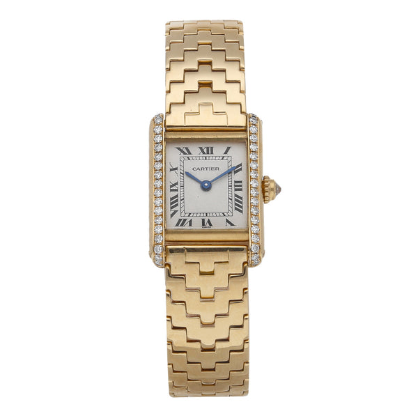 Reloj Cartier para dama modelo Tank en oro amarillo 18 kilates.