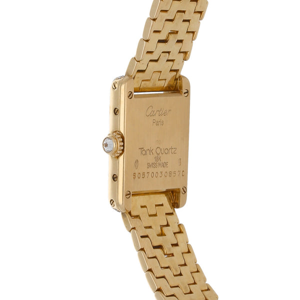 Reloj Cartier para dama modelo Tank en oro amarillo 18 kilates.