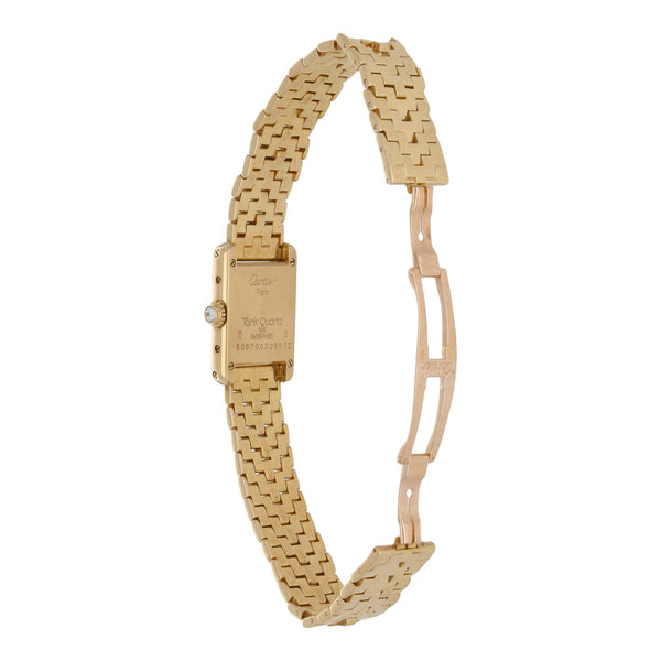 Reloj Cartier para dama modelo Tank en oro amarillo 18 kilates.